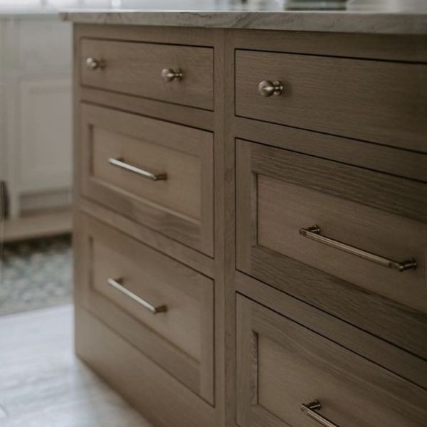 Wood Inset Cabinet Drawers with Flush Panel Fronts Wood grain inset cabinet drawers with flush panel fronts and integrated hardware for modern kitchen design