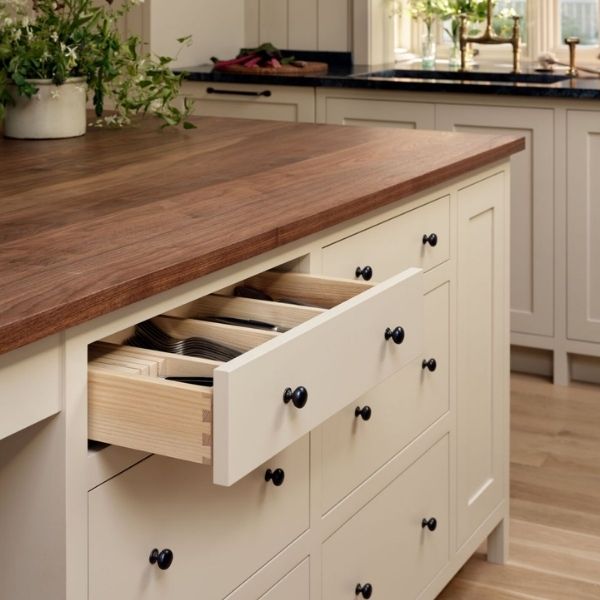 Inset Cabinet Drawer with Dovetail Joinery Inset kitchen cabinet drawer with dovetail joinery and flush front panel in a modern kitchen island
