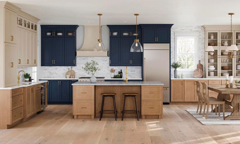Kitchen combining painted cabinets and stained wood island