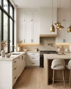 Modern painted kitchen cabinets with white shaker doors and navy island