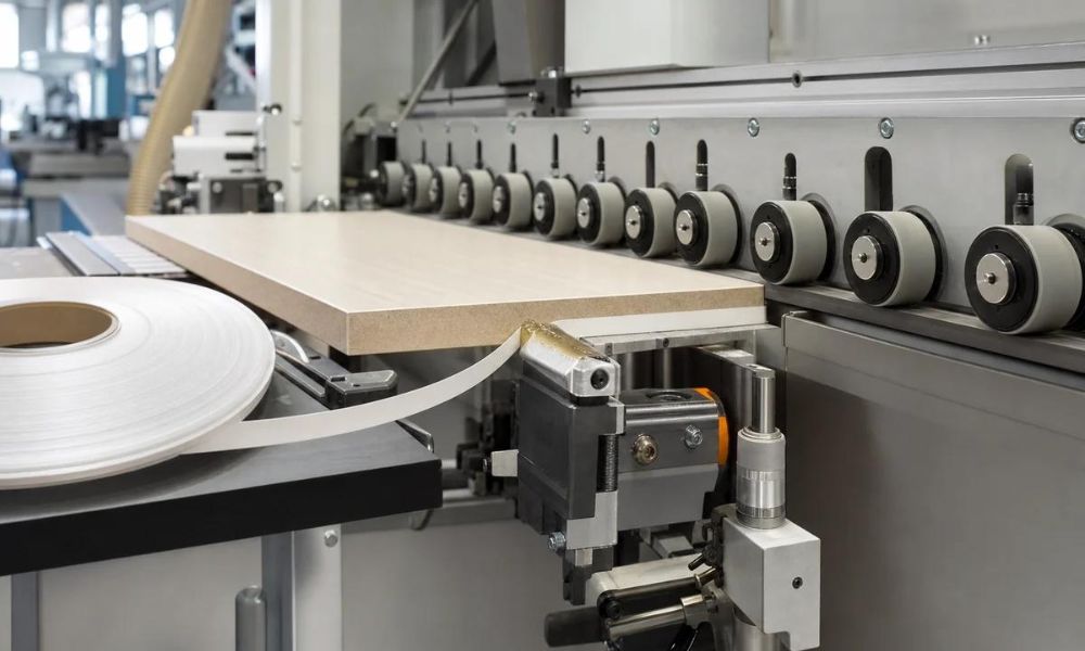 Kitchen cabinet edge banding wholesale OEM automatic production process using pressure rollers and PVC edge tape.